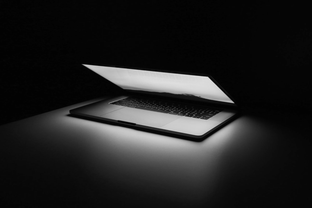 A Macbook Pro in the dark